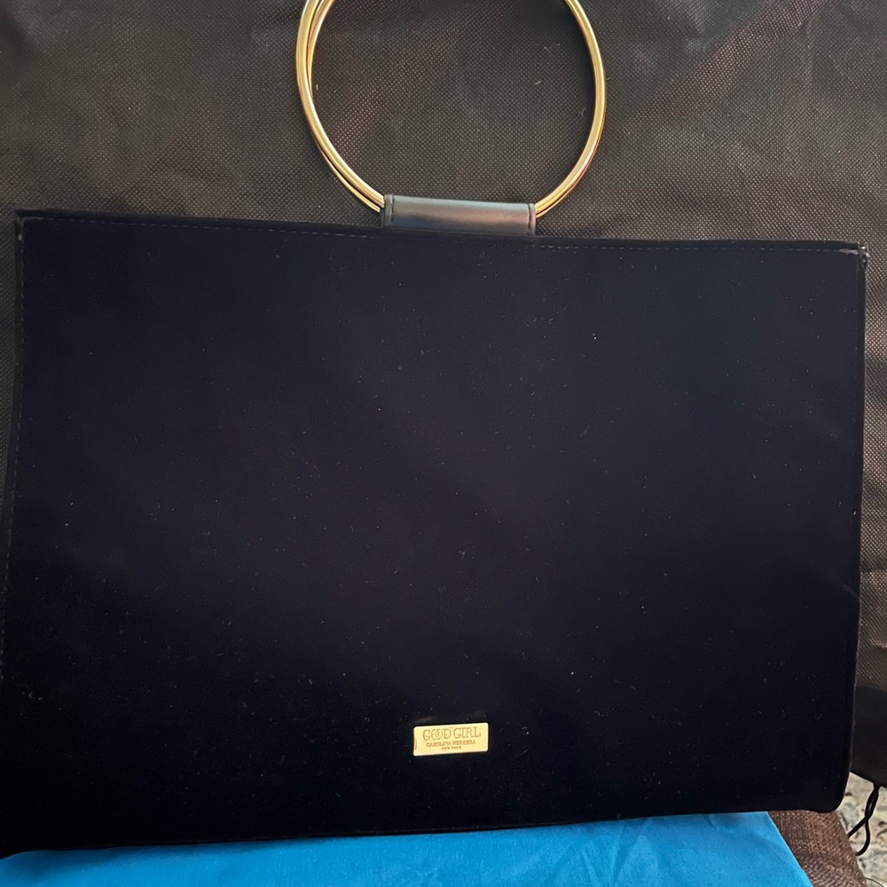Chic Black Handbag with Gold Accents